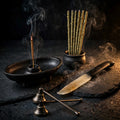 Home Protection Ritual Kit: canoe burner, mugwort, athame and snuffer on dark slate
