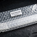 Selenite incense burner in bubble wrap packaging