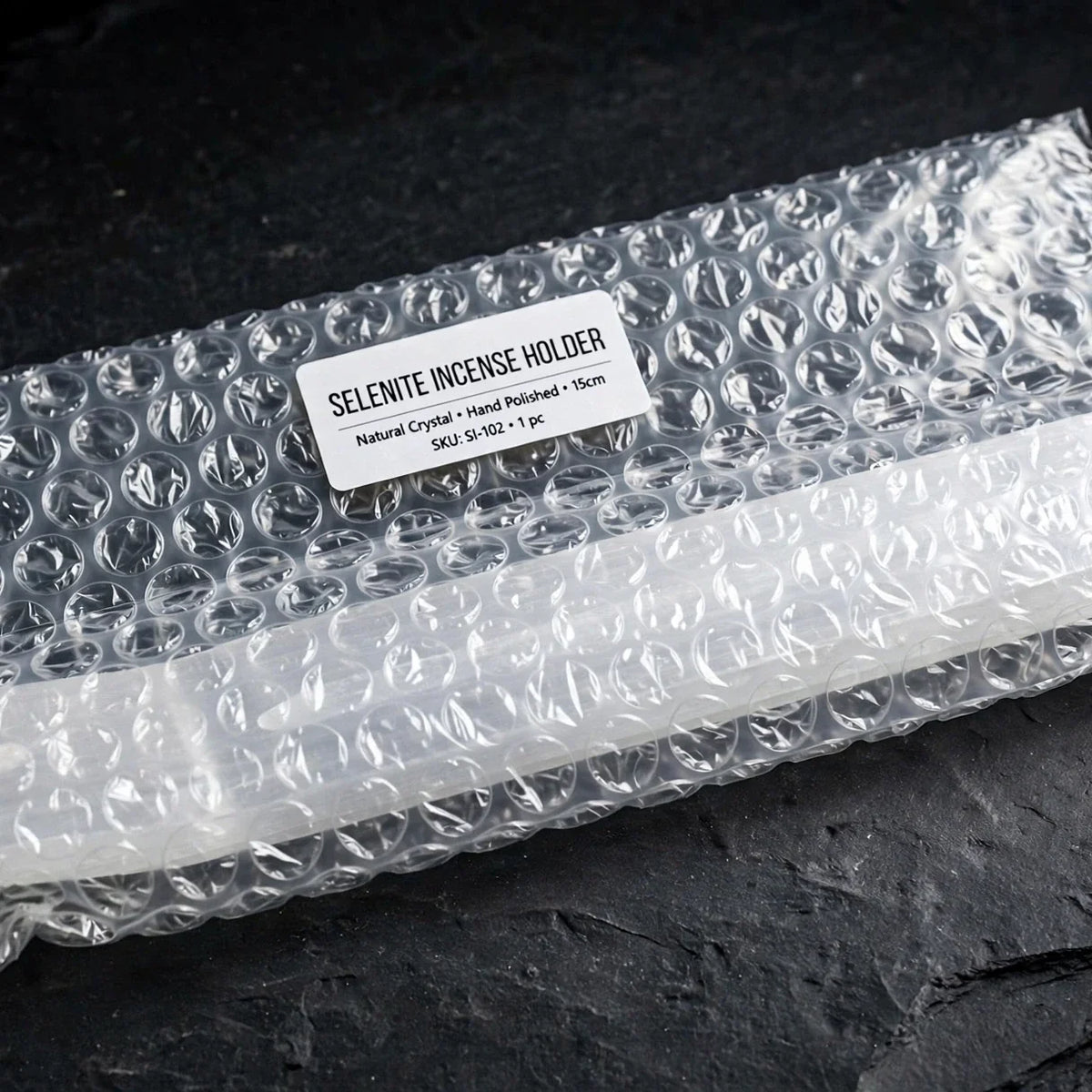Selenite incense burner in bubble wrap packaging